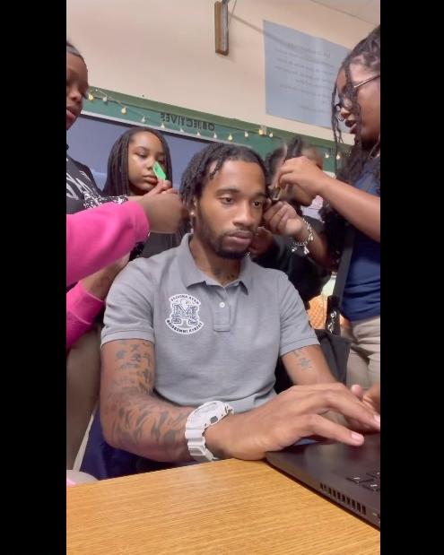 students unbraiding teachers hair